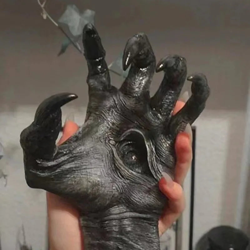 Scary witch hand wall decor for Halloween details top view with eye