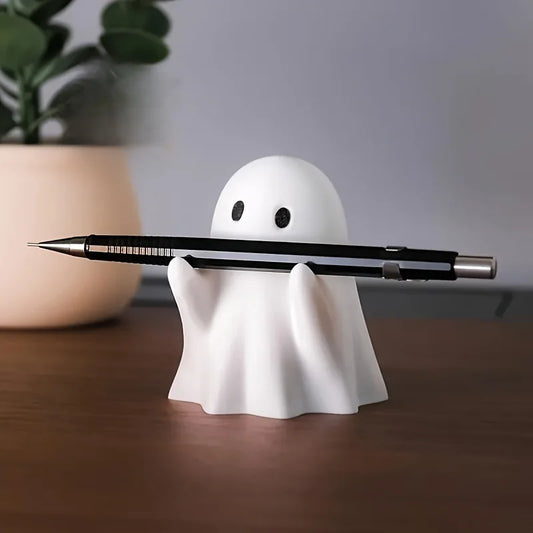 Top view of ordinary ghost desk organiser – spooky yet practical desktop storage